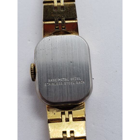 Women\'s Timex watch. Small Gold face with bracelet style band. main image 4